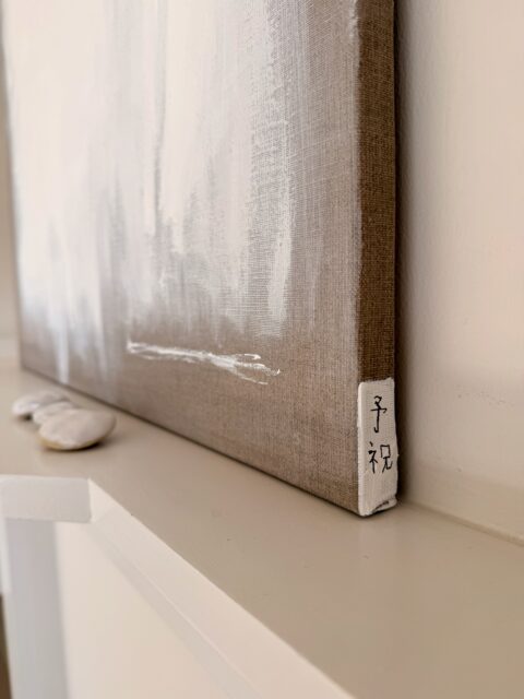 Room with natural materials and art works